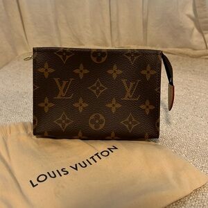 LV mini toiletry bag
